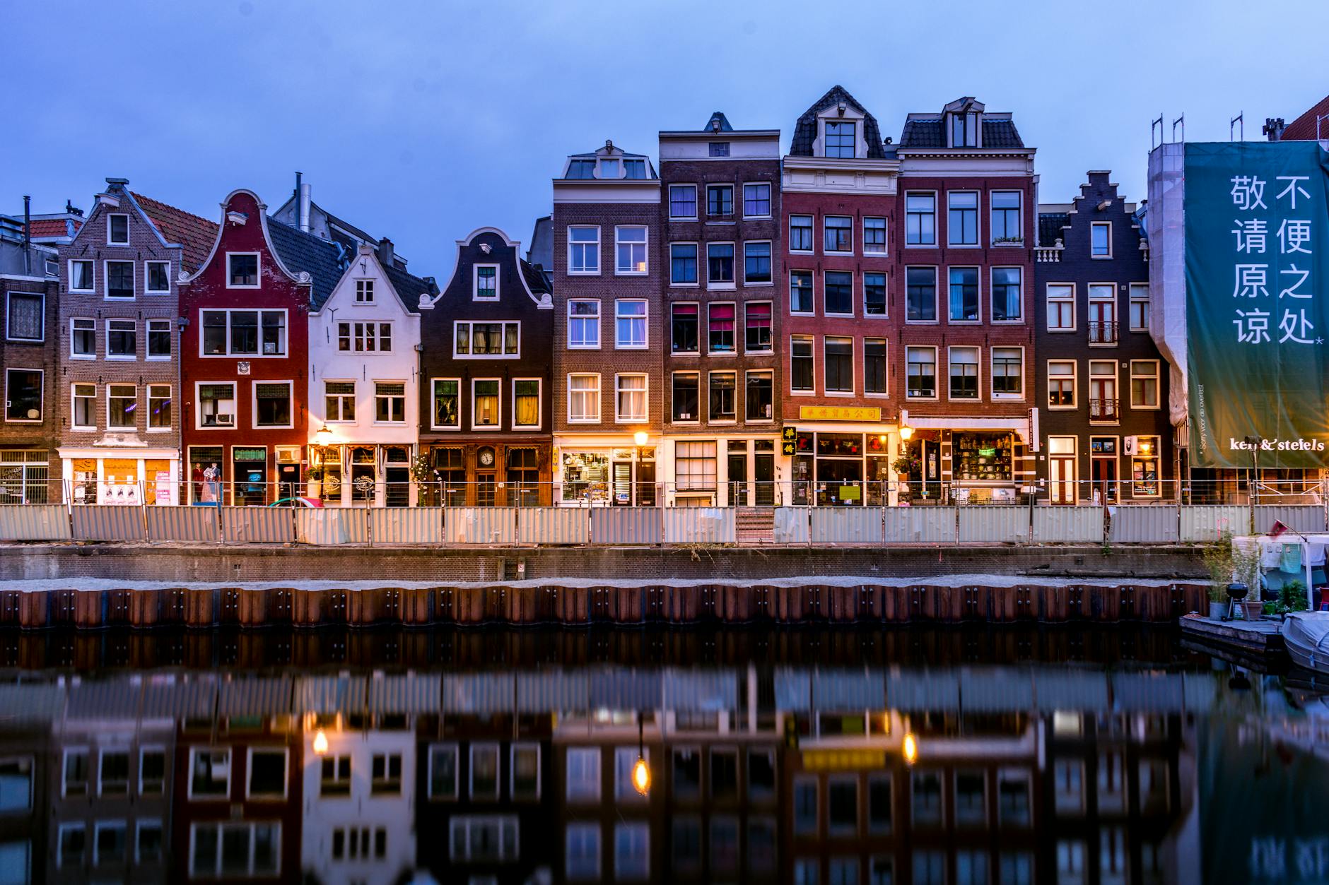 charming amsterdam canal houses at twilight
